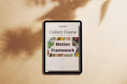 Tablet displaying a culinary course app on a textured beige surface