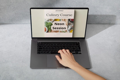 Person using a laptop with a Culinary Course on the screen, on a gray surface.